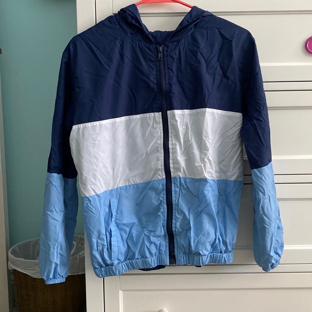 Blue and white windbreaker